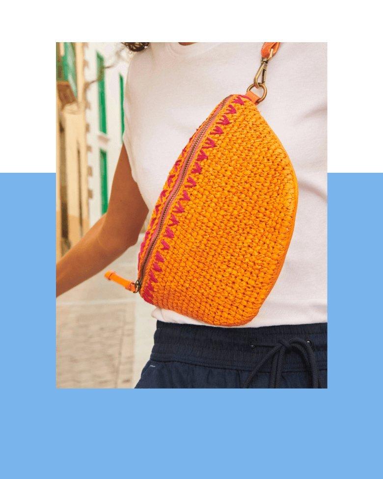 closeup of orange crochet bag